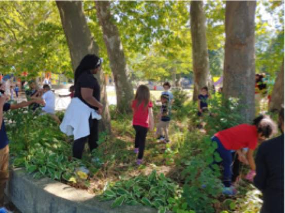 learning outdoors at Shawmut Hills sycamore circle mural site